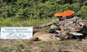 Nate and son velvet buck at Deep South hunting services